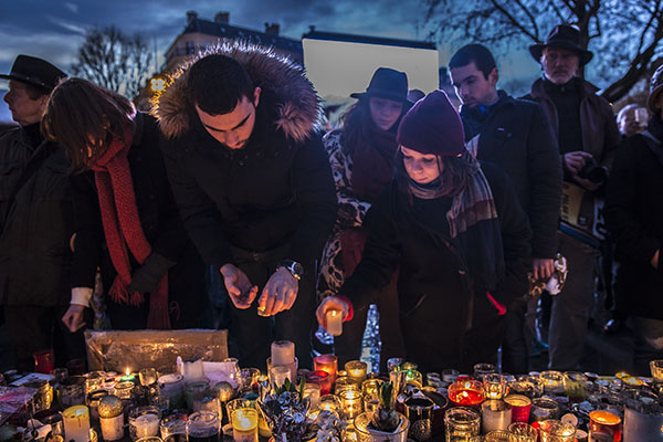 Tributes are left for victims of a terror attack. Image: iStock.