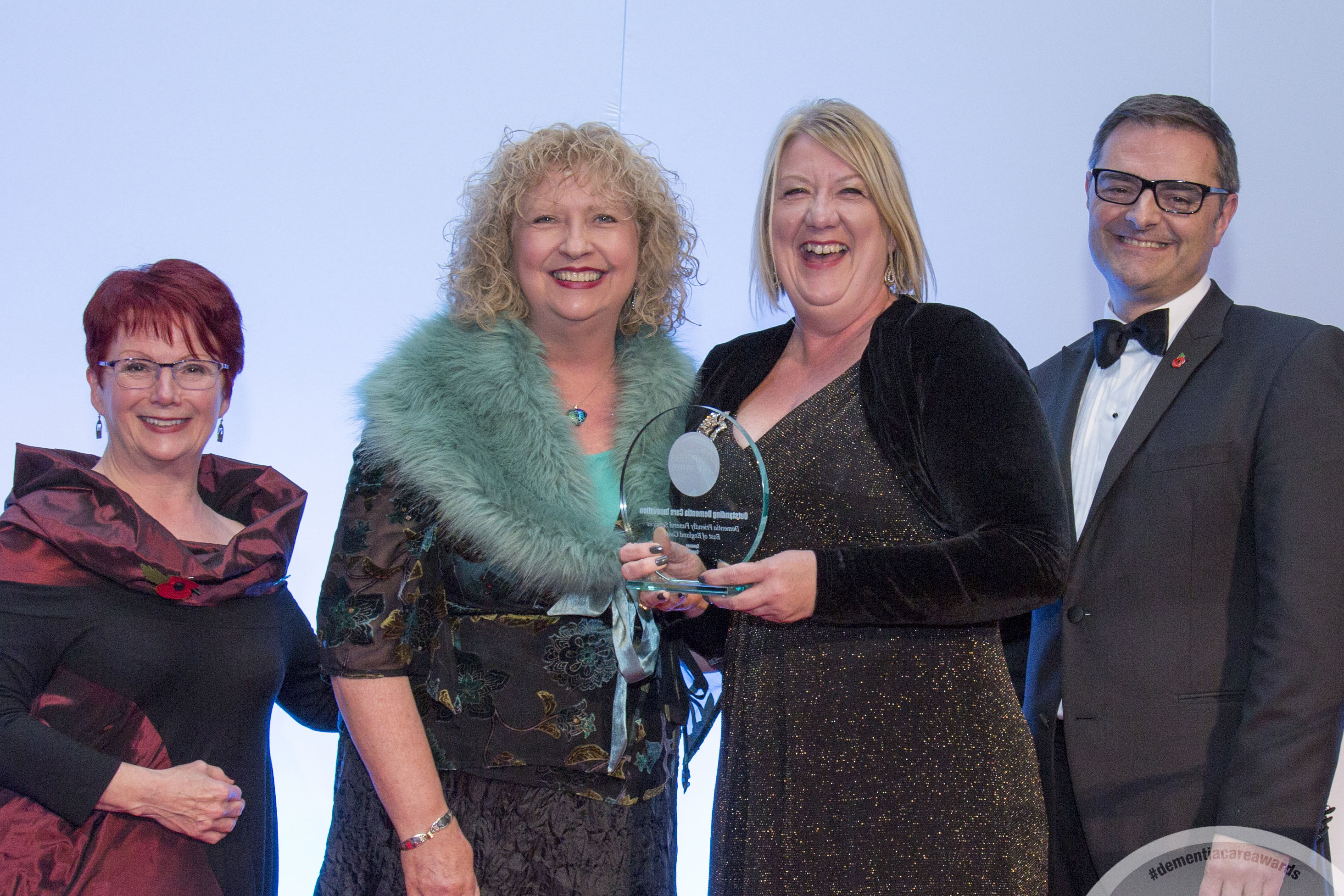 Danuta Lipinska (second from the left) receives the Outstanding Dementia Care award