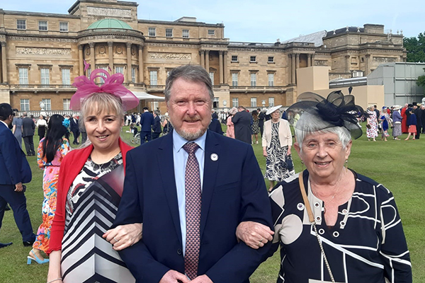 Kathryn Gough, Andrew Gill and Meg Gough attended a Buckingham Palace garden party