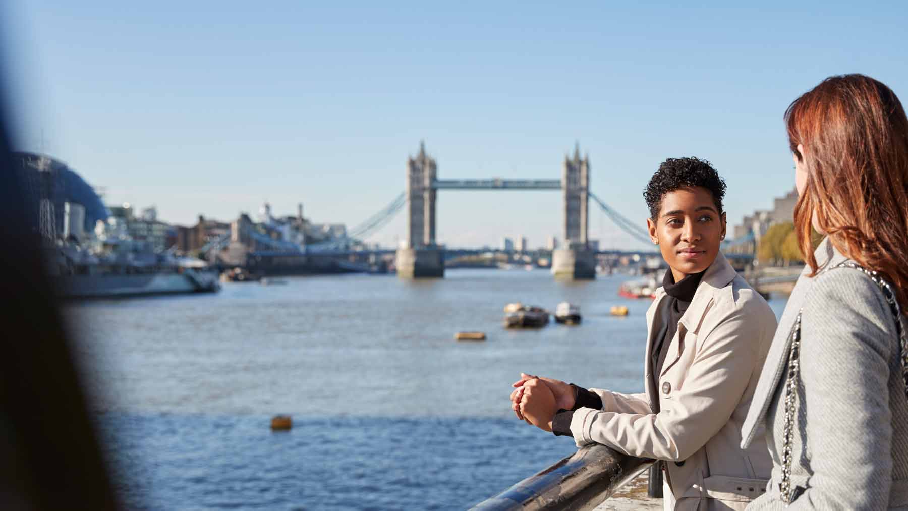 Two women discuss therapy by London Bridge